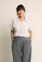 Load image into Gallery viewer, Woman wearing a striped shirt and gray wide-leg pants against a plain background
