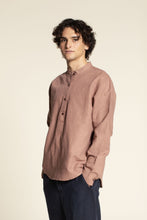Load image into Gallery viewer, Man wearing a brown shirt against a beige background
