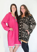 Load image into Gallery viewer, Two Brunette white women standing together smiling with hands on their hips standing in front of a white studio backdrop, wearing the Moroccan Djellaba woman on the left is wearing the pullover while woman on the right is wearing one made with a front zipper.
