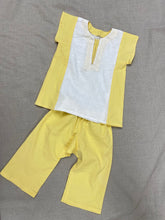 Load image into Gallery viewer, Flat lay of the yellow and white Turkish tunic and pants.
